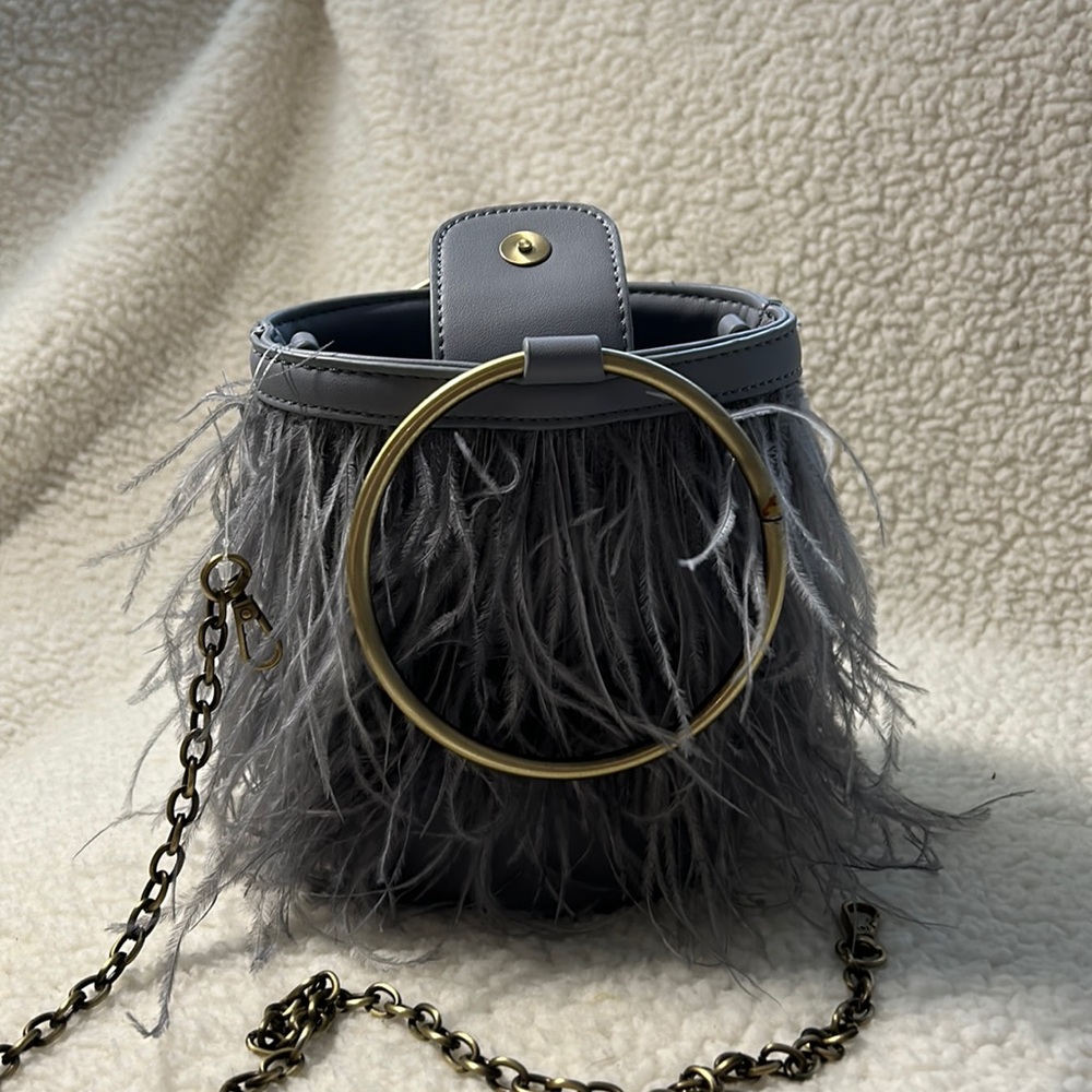 Anthropologie mini feather bag